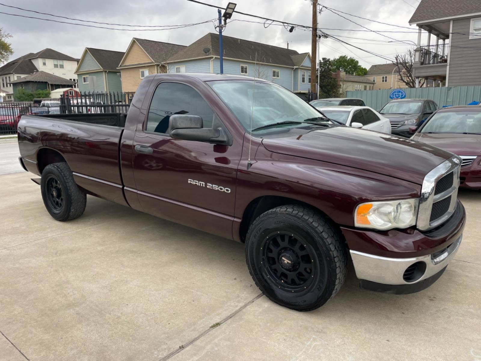 2004 Maroon /Black Dodge Ram 2500 Laramie 2WD (3D7KA26C44G) with an 5.9L L6 OHV 24V TURBO DIESEL engine, Automatic transmission, located at 1501 West 15th St., Houston, 77008, (713) 869-2925, 29.797941, -95.411789 - Photo #1
